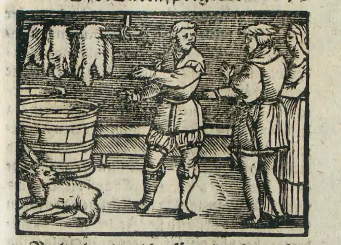 Illustration aus einem historischen Till Eulenspiegel-Druck: Eulenspiegel näht eine lebende Katze in ein Hasenfell und verkauft sie als ‚Hasen‘ an die Kürschner in Leipzig. Darstellung des Sprichworts ‚Die Katze im Sack kaufen‘. Wunderbarlich und seltzame Historien Tyl Eulenspiegels Eines Bawren Son, bürtig auß dem Land zu Braunschweig. München, Bayerische Staatsbibliothek -- Res/P.o.germ. 332 d, S.I. 1593, fol. 79r, online unter: https://www.digitale-sammlungen.de/de/view/bsb00089935?page=160,161 (zuletzt aufgerufen am 21.01.2026).